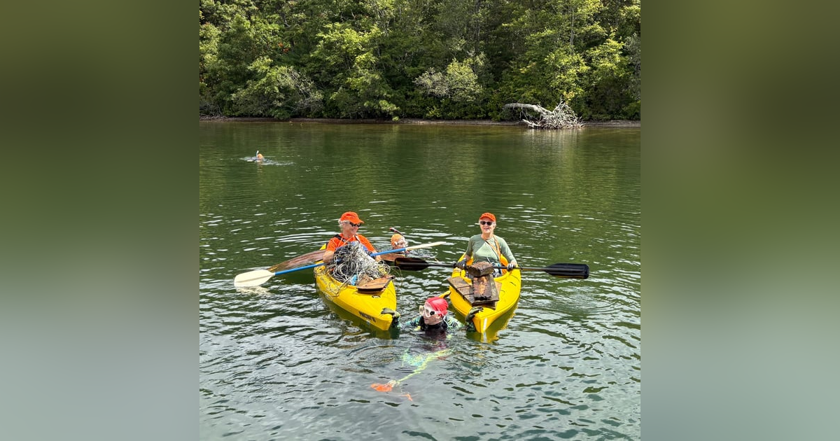 The group diving for beer cans and baby doll heads The group diving for beer cans and baby doll heads