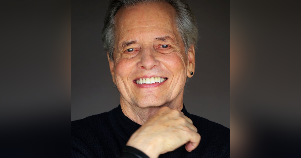 Mark W. Travis Mark W. Travis